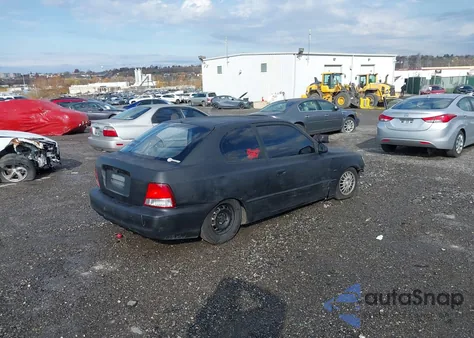 2001 Hyundai Accent Gs z USA, uszkodzony, nr VIN KMHCG35C61U119724